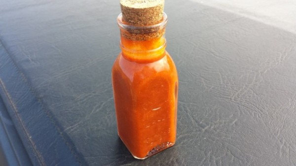 Chili Tepin pepper hot sauce... with the seeds, and no artificial colors.