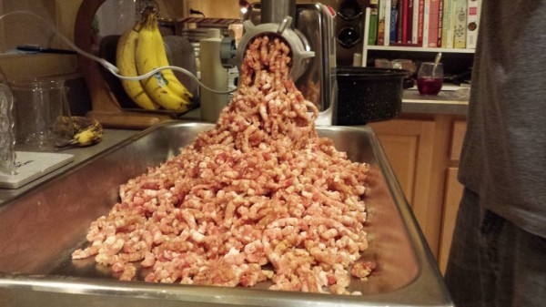 Grinding sausage.
